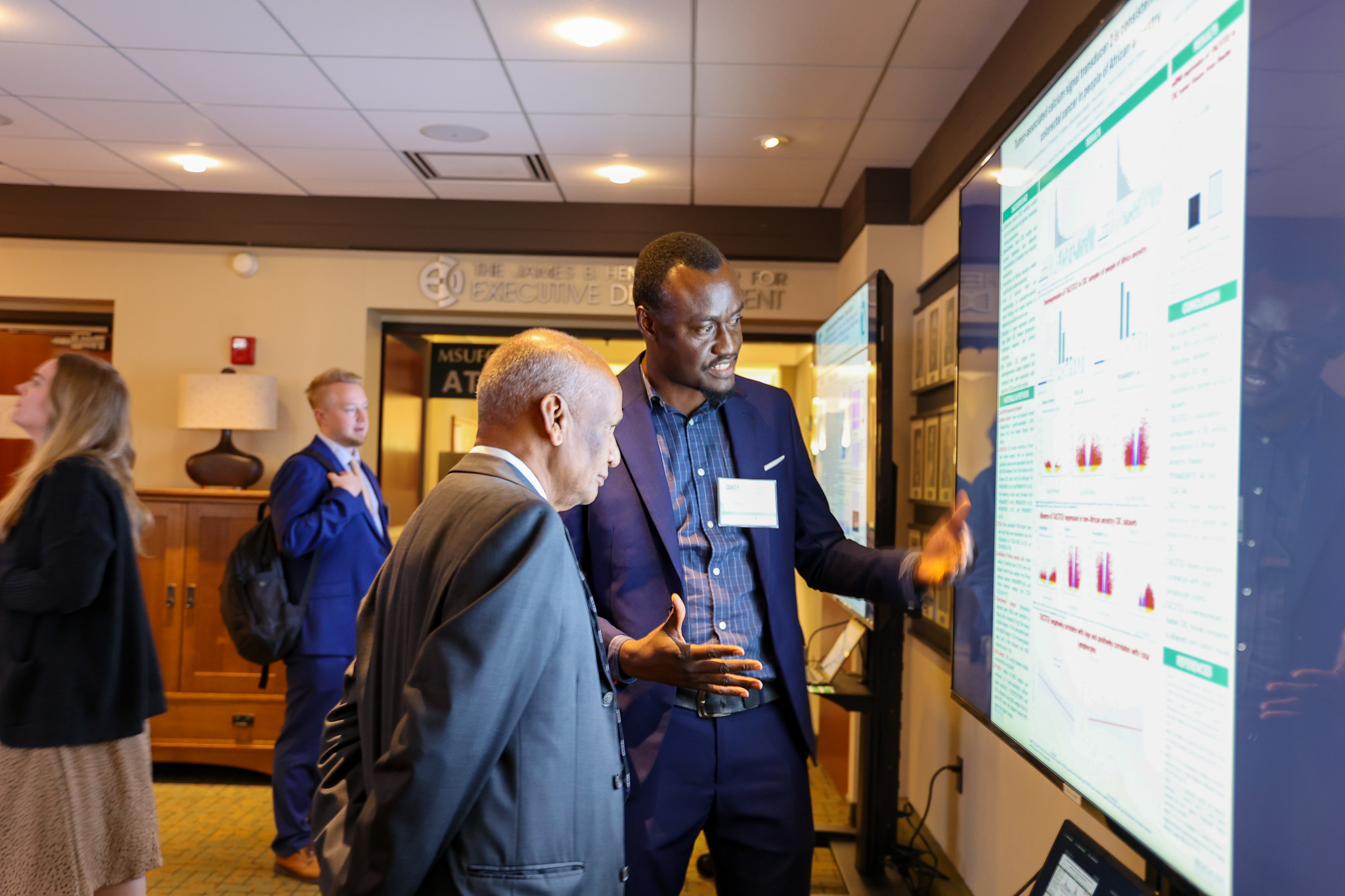 research poster presenter at symposium